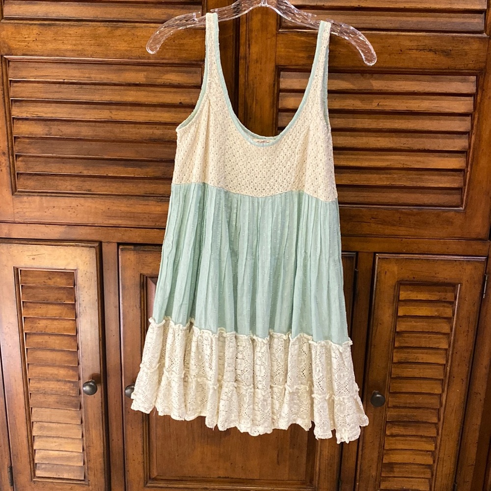 Baby doll dress says size 1, but this fits like a Medium.